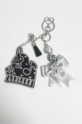 Piano keychain/bagcharm w handbeaded n bow bagcharm