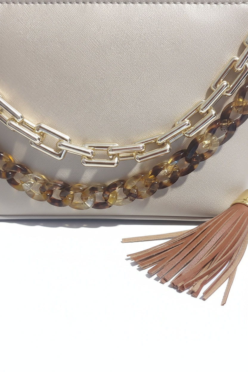 Gold shoulder purse w/bagchains, butterfly keychain/bagcharm and tassle bagcharm all included